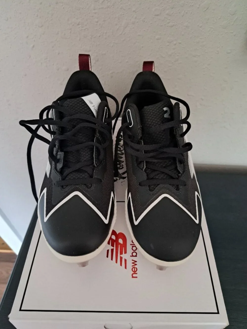 New Balance molded cleats